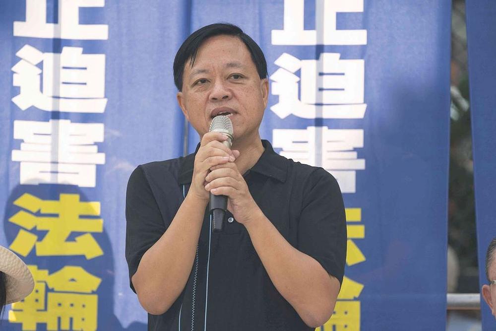 Bivši okružni vijećnik Lam Wing-yin je rekao da prihvaća principe Falun Gonga Istinitost-Dobrodušnost -Toleranciju.