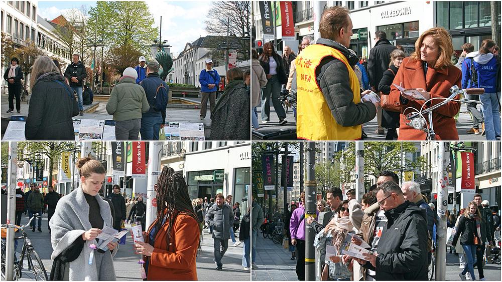 Praktikanti razgovaraju s prolaznicima o Falun Dafa u centru grada Antwerpena 9. aprila 2022. godine